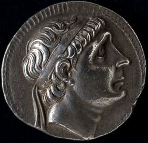 Image of Tetradrachm (coin); obverse: Head of Antiochus; reverse: Seated Apollo Holding Arrow