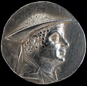Image of Tetradrachm (coin); obverse: Portrait Bust of Antiochus with Kausia; reverse: Poseidon Holding Trident
